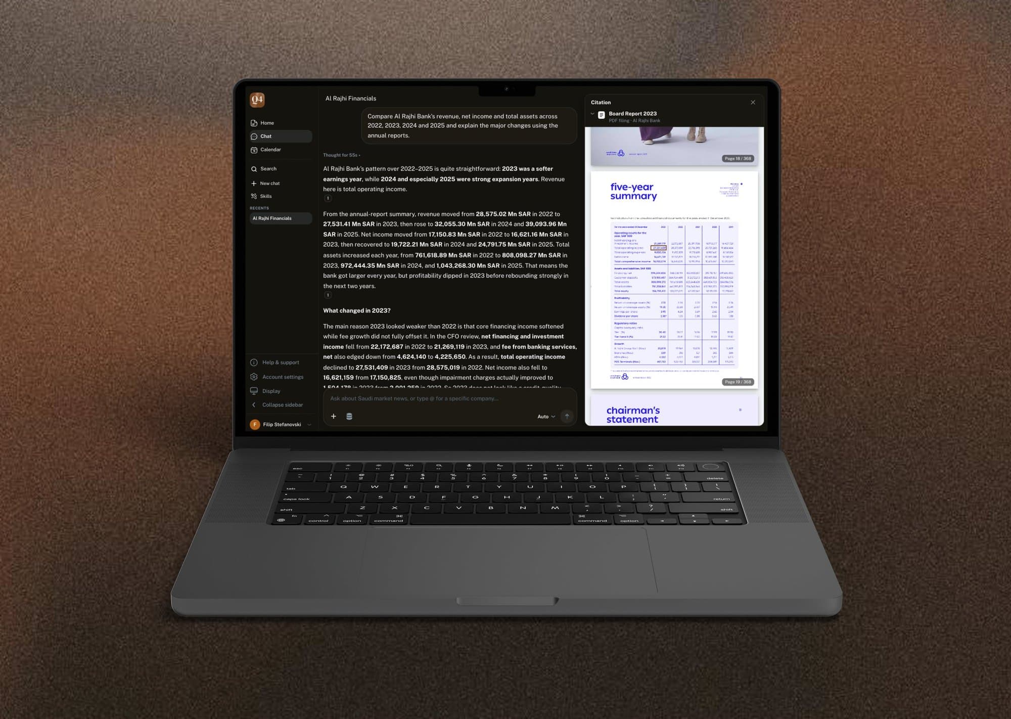 Q4 on a laptop: an answer beside its cited source.